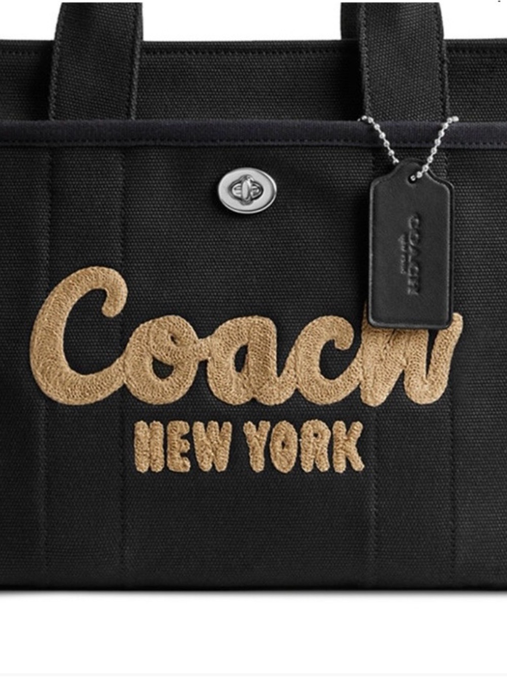 Coach Black Canvas Tote with Tan Script Logo Patch